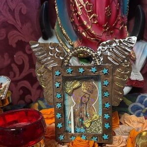 Tin nicho with blessed mother